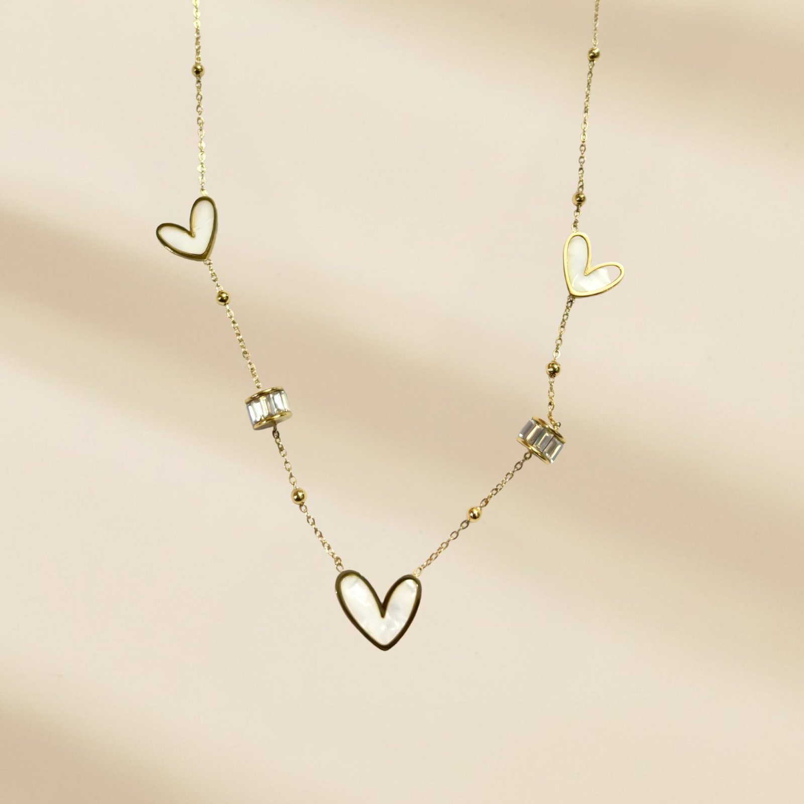Gold plated anti tarnish white heart pendant